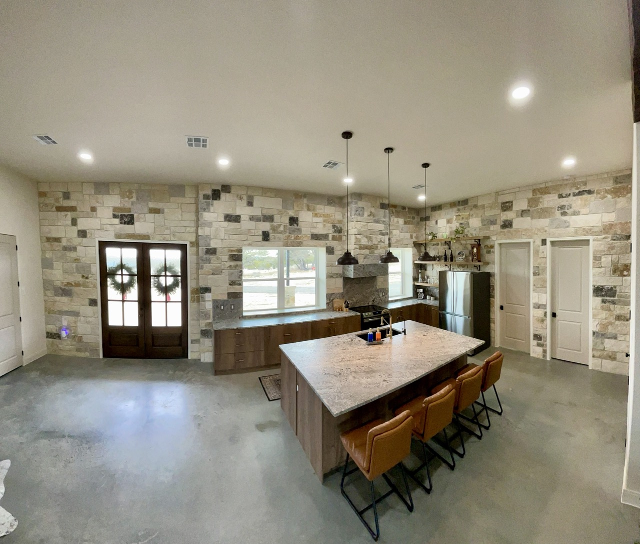 Warm wood custom kitchen cabinetry and island
